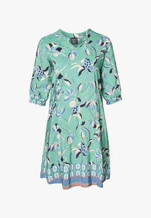 Green floral printed dress with three-quarter sleeves, round neckline, and a patterned hem. Fabric has a smooth texture with a subtle sheen.