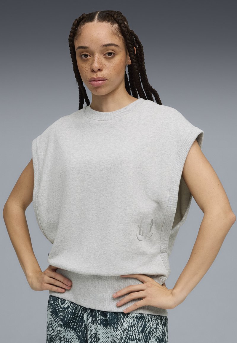 Gray oversized sleeveless sweatshirt made of soft fabric with a ribbed neckline and subtle logo detail in light gray on the front.