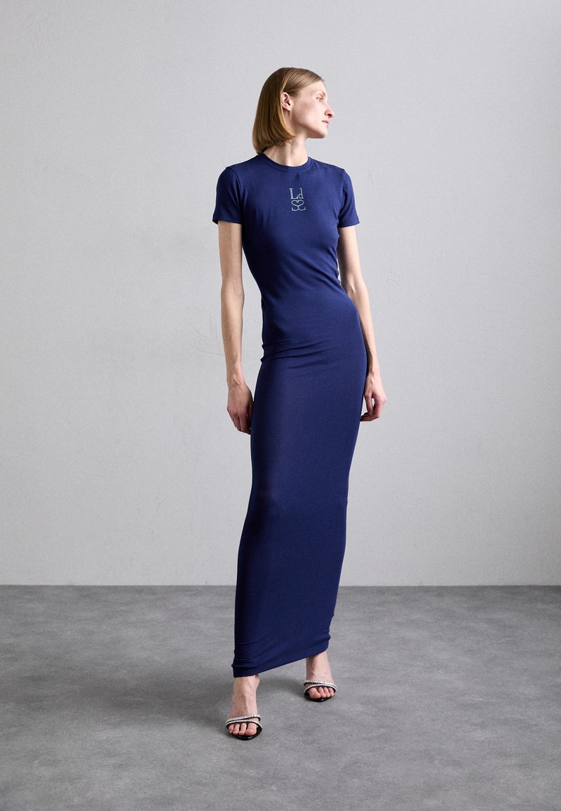 Navy blue maxi dress made of stretchy fabric, featuring a fitted design, short sleeves, and a small logo graphic on the chest.