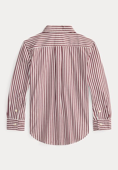 Sarkanais un baltais svītrainais krekls ar garām piedurknēm, pogu aprocēm un klasisku apkakli. Aizmugurē ir josta un krokas detaļa.