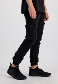 Alpha Industries TWILL JOGGER - Kapsáče - black
