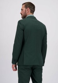 Donkergroene heren colbert, slim fit met een gladde textuur, eén knoops ontwerp, met gesneden revers en mouwmanchetten met drie knopen.