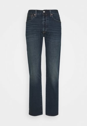 Jeans in denim blu scuro con design a gamba diritta, cinque tasche e leggere scoloriture. Completati con un bottone metallico e chiusura con zip.