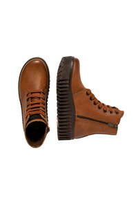 Bottines en cuir marron avec une semelle texturée, un bout rond, des lacets à l'avant et une fermeture éclair sur le côté pour un accès facile.