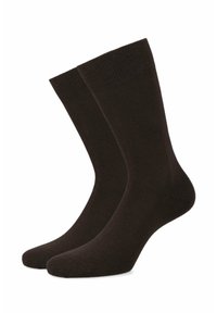 Brązowe skarpetki bawełniane z prążkowanymi mankietami. Standardowa długość crew, gładka tekstura, zaokrąglony palec i wzmocniona pięta dla większej trwałości.