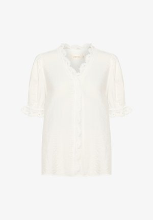 Fehér blúz rövid puffos ujjakkal, csipkeszegéllyel a gallér és az ujjak mentén, valamint gombos elejével. Könnyű anyagból készült.