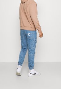 Karl Kani Vaqueros tapered - blue