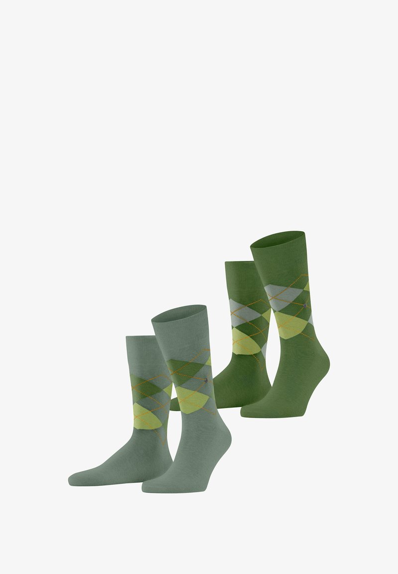 Four pairs of socks in shades of green. Two pairs feature an argyle pattern with light green, dark green, and gray diamonds. Soft texture.