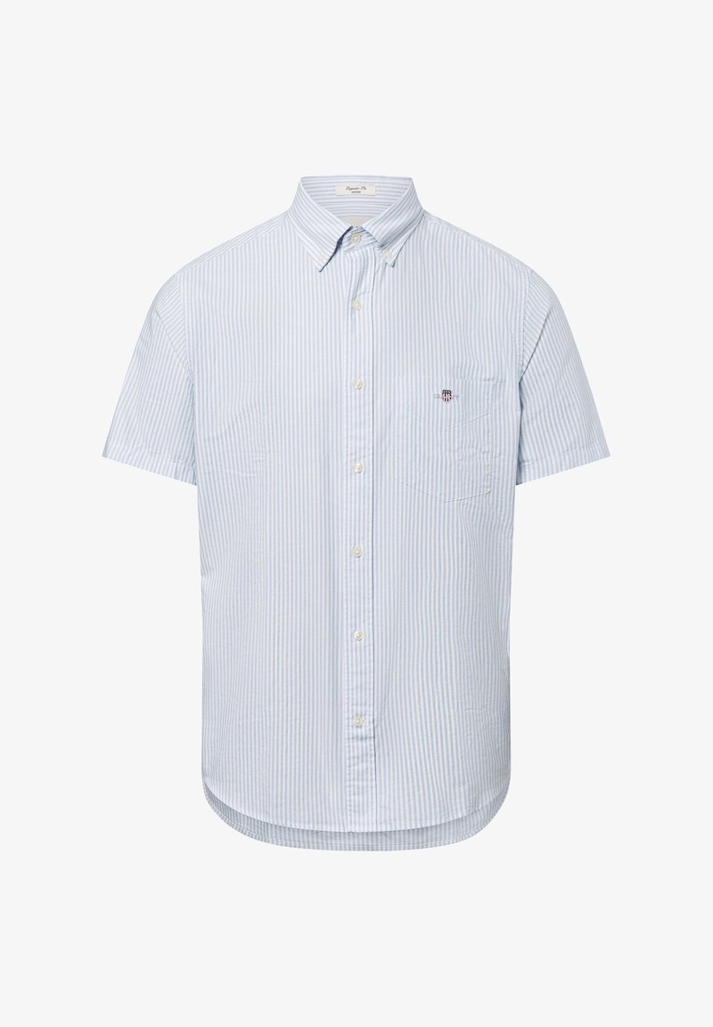 Kortärmige knoopshirt in lichtblauw met witte strepen, voorzien van een borstzak en een afgeronde zoom. Gemaakt van geweven stof.