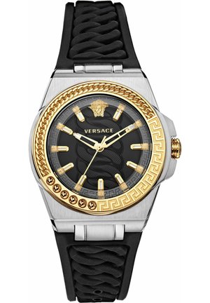 Versace Uhr mit schwarzem Gummiband, silbernem Gehäuse, goldenen Akzenten, strukturiertem schwarzen Zifferblatt mit Löwenemblem und griechischem Schlüsselmuster.