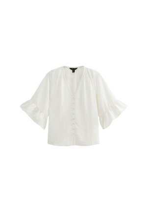 Weiße Bluse mit V-Ausschnitt, puffigen Ärmeln und vorderer Knopföffnung. Strukturiertes Material mit leichtem Glanz und Rüschendetails an den Ärmeln.