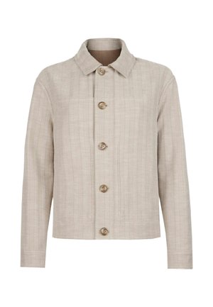 Veste beige à motif chevron avec manches longues, col pointu et cinq boutons sur le devant.