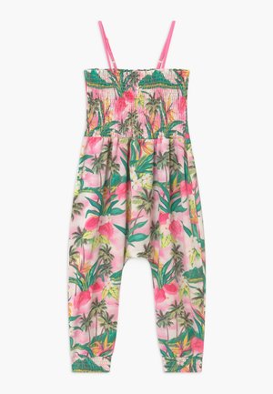 Combinaison bustier rose à motif floral tropical, corsage froncé, bretelles roses réglables et poignets élastiques aux chevilles.