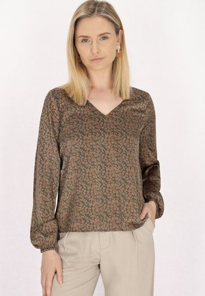 Blusa a maniche lunghe, con scollo a V, in tessuto verde scuro con piccolo motivo floreale marrone. Presenta polsini elastici e un design morbido.