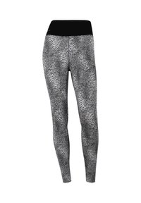Leggings a motivi bianchi e neri con un alta vita, realizzate in un tessuto elastico con un design texturizzato simile a quello di un serpente.