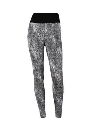 Zwart-witte gemusterde leggings met een hoge tailleband, gemaakt van rekbare stof met een textuur die lijkt op een slang.