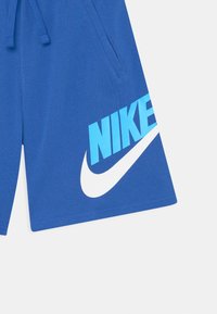 Nike Sportswear CLUB UNISEX - Teplákové kalhoty - game royal