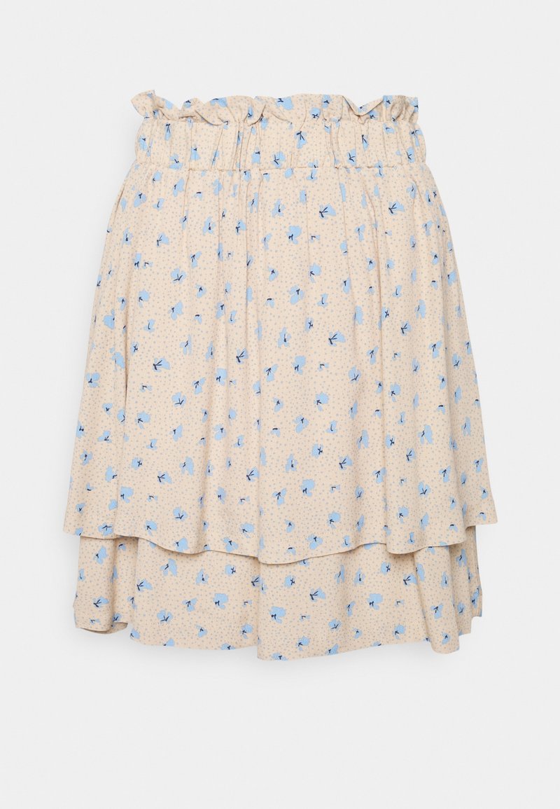 Jupe beige à couches avec une taille élastique froncée, décorée d’un petit motif floral bleu.