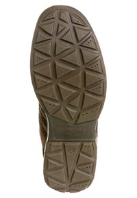 Brown sneaker with a textured rubber sole featuring triangular patterns. Side has black and dark brown stripes. Size 42 visible on sole.