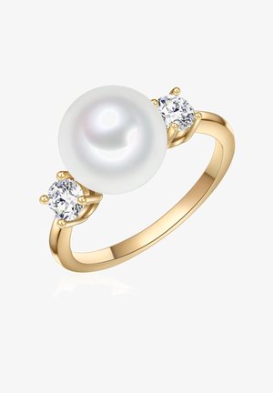 Zelts gredzens ar lielu balto pērli centrā, ko apņem divi apaļi, mirdzoši dimanti. Gluda, pulēta josla.