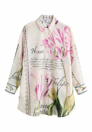 Cream long-sleeve button-up shirt with pink tulip prints and black cursive text across the fabric, featuring a classic collar.