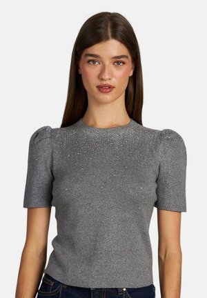 Top grigio a maniche corte in maglia con spalle a palloncino, con sottili dettagli scintillanti e un design aderente. Tessuto strutturato con leggero lucido.