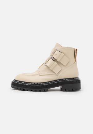 LUG SOLE BUCKLE BOOTS - Platform ankle boots - natural