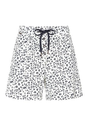 Leopard print shorts in white with dark spots, featuring a drawstring waist, button closure, and side pockets. Made from lightweight fabric.