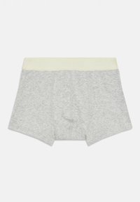 Boxers grises avec une ceinture rayée jaune clair. Fabriqués en tissu doux, avec des coutures et une taille mi-haute.