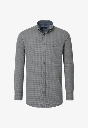 Karierte Button-up-Bluse in Schwarz und Weiß, mit langen Ärmeln, Kragen, Brusttasche und abgerundetem Saum. Der Stoff wirkt texturiert.