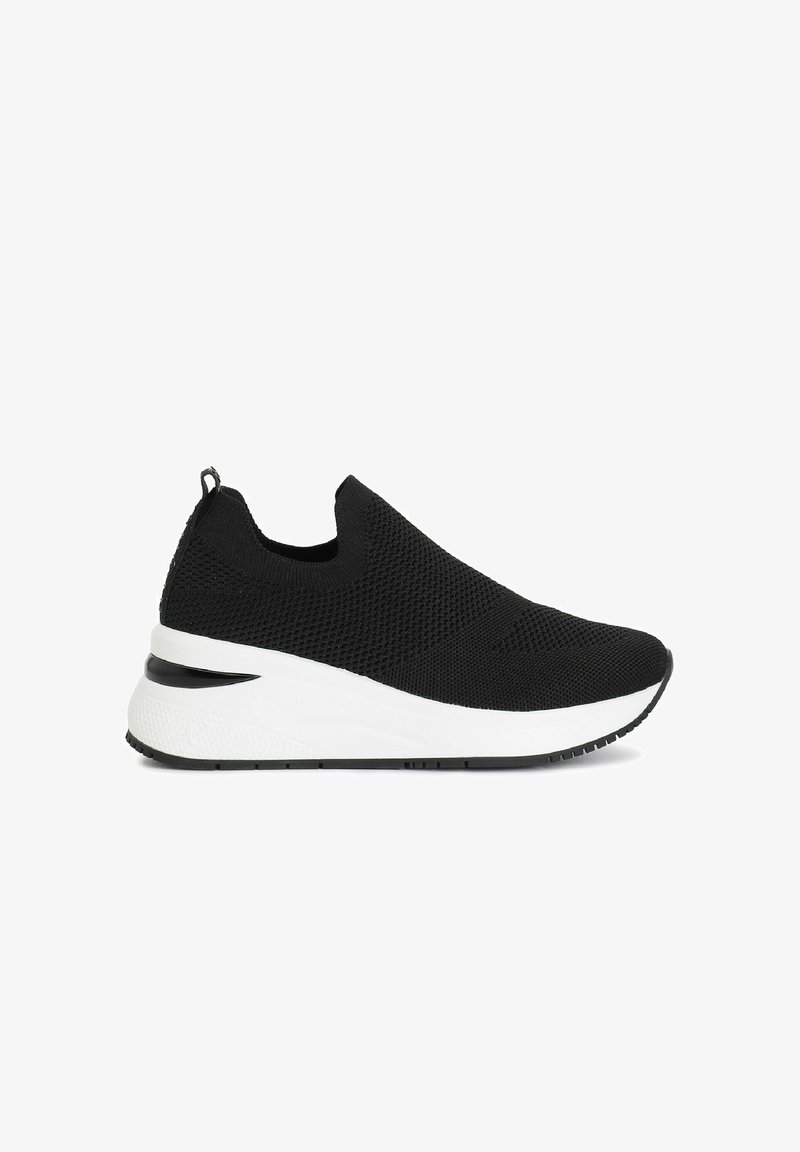 Black knitted sneaker with a slip-on design, a white midsole, black outsole, and subtle texture details on the upper material.