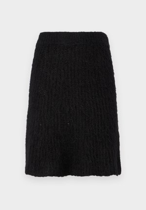 Black knitted skirt with a textured pattern, mid-length, and wide waistband. Material appears soft with a slightly fuzzy surface.