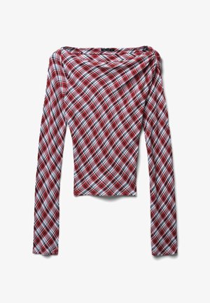 Red, white, and black plaid long-sleeve top with a wide neckline and fitted silhouette displayed against a white background.