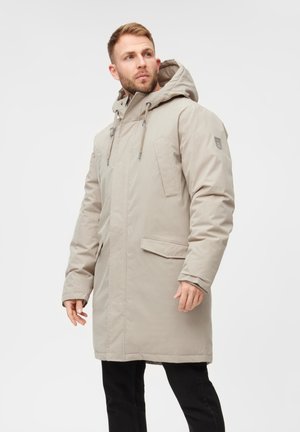 Parka isolata beige con cappuccio, dotata di due tasche frontali e cordini regolabili. Tessuto dalla texture liscia, design a taglio dritto.