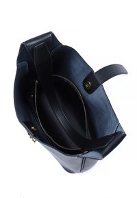 Black leather handbag with a smooth texture, interior zip pocket, and gold-tone hardware. The design features a structured shape and sturdy handles.