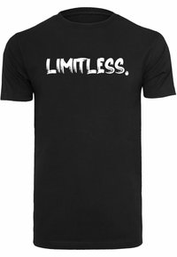 Svart bomulls T-skjorte med ordet "LIMITLESS." i fet hvit penselstrokes font over brystet. Korte ermer, rund hals design.