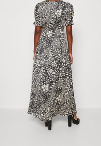 NAF NAF Maxiklänning - black