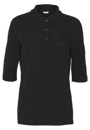 Polo noir avec un col, des manches trois quarts et des boutons noirs. Dispose d'un petit logo brodé sur la poitrine. En matière de coton.