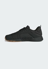 Black athletic shoe featuring a mesh upper, rubber sole, and angular textured design on the side. Dark laces and padded collar included.