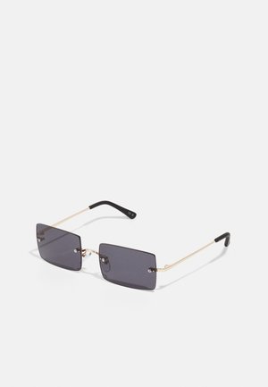 Rectangular sunglasses with dark lenses, gold metal frame, and black temple tips. Features small screws and minimalistic design.