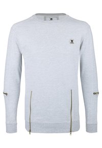 Sudadera gris claro con mangas largas, puños acanalados, detalles de cremallera en los costados y un pequeño logo en el pecho izquierdo. Textura suave.