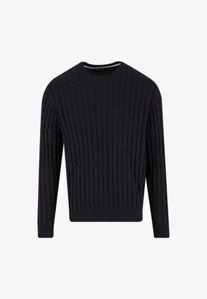 Pull en maille bleu marine avec un design en cable texturé, col rond et manches longues. Poignets et taille côtelés pour un ajustement confortable.