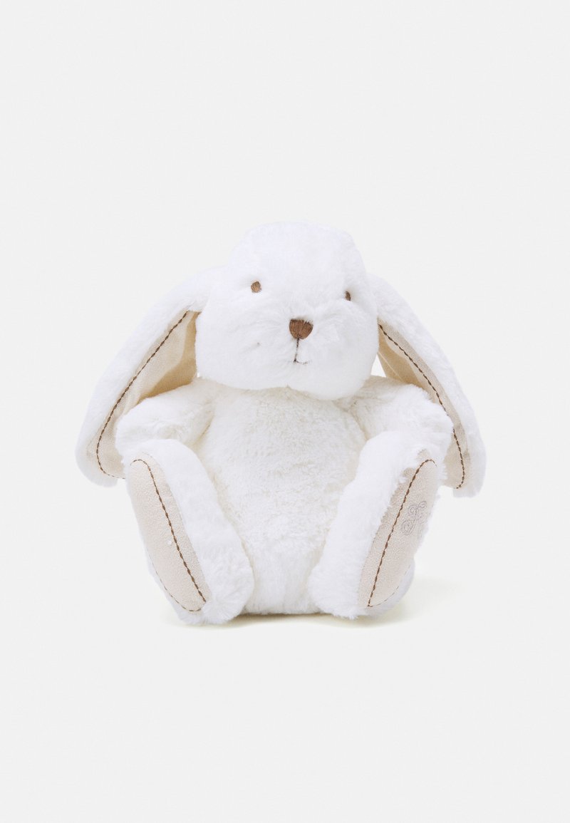 Jouet en peluche blanc en forme de lapin avec de longues oreilles beige, des traits du visage brodés et un corps doux et texturé. La base est arrondie pour plus de stabilité.