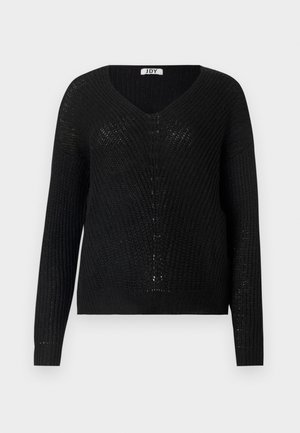 Čierny pletený sveter s výstrihom do V, dlhými rukávmi a voľným strihom. Textúra má jemný otvorený vzor.