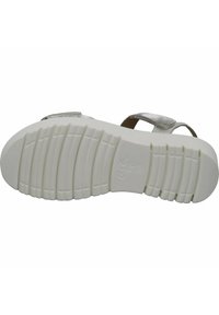 Suola in gomma bianca con un pattern di grip testurizzato. Cinghie regolabili in metallo argentato sulla parte superiore per una vestibilità sicura.