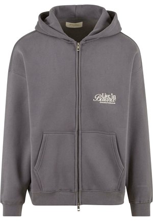 Gray zip-up hoodie made of soft fabric, featuring a front pocket, ribbed cuffs, and a "Live in Balance" logo in white.