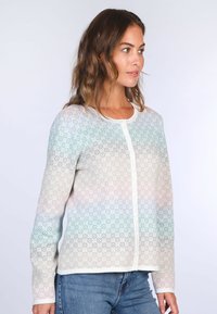 Leichter Cardigan in Pastellfarben, mit floralem Muster, rundem Ausschnitt und Knopfverschluss, aus weichem, strukturiertem Stoff gefertigt.