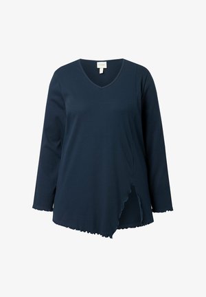 Tunica a maniche lunghe blu navy con scollatura a V, caratterizzata da un tessuto testurizzato, orlo asimmetrico con bordi ondulati e una vestibilità comoda.