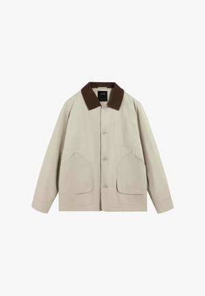 Beige jas gemaakt van gladde stof, met een bruine kraag, sluiting met knopen aan de voorkant en twee grote zijzakken. Inclusief één borstzak.