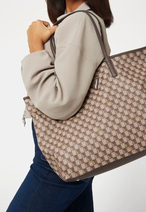 Brown patterned tote bag with textured fabric, featuring a geometric design. Equipped with two shoulder straps and a contrasting brown base.
